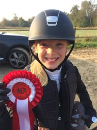Josefine fra HER. stævnet flot nr 1 i LC på hesten Stracato..